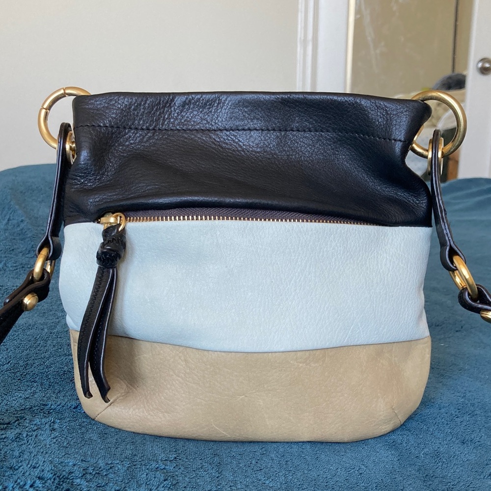 B. Makowsky Stylish Black, Cream, and Tan crossbody bag